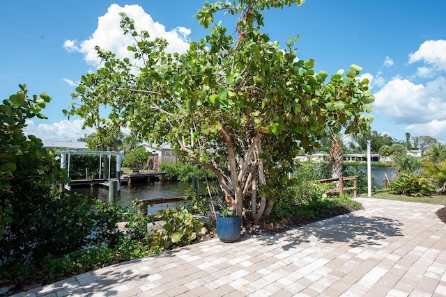 1060 Haste Ln, Englewood, FL 34223 - view of patio / terrace with a water view