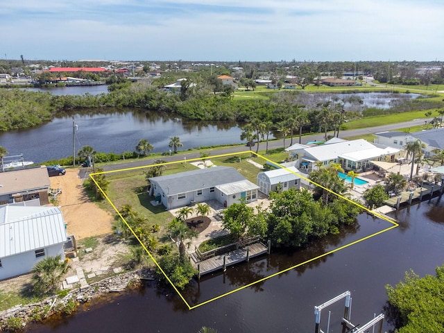 1060 Haste Ln, Englewood, FL 34223 - aerial view of property's location with property boundaries highlighted and a nearby body of water