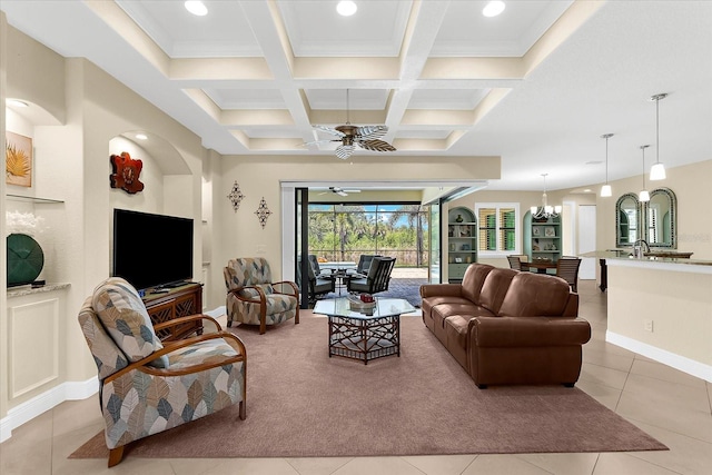 10029 Boylston St, Port Charlotte, FL 33981 - living room with a ceiling fan, a chandelier, coffered ceiling, beamed ceiling, and light tile patterned floors