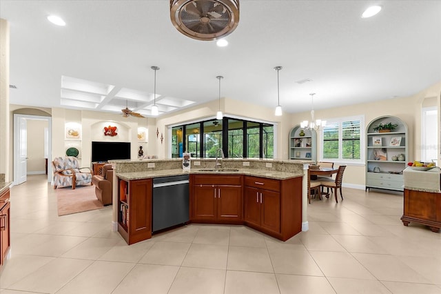 10029 Boylston St, Port Charlotte, FL 33981 - kitchen with dishwashing machine, open floor plan, light stone counters, a chandelier, and recessed lighting