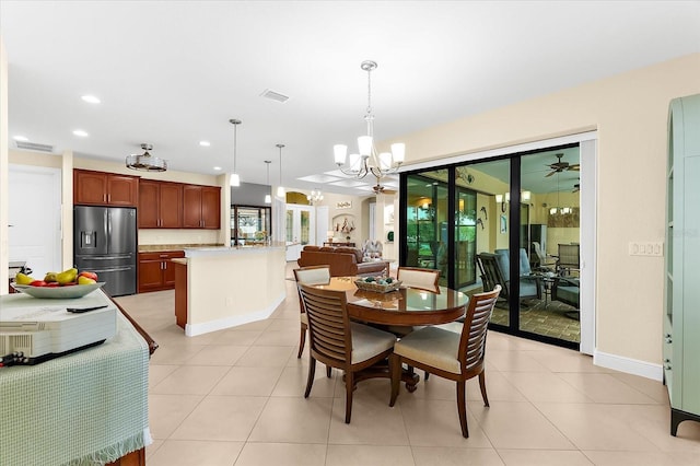 10029 Boylston St, Port Charlotte, FL 33981 - dining room featuring a chandelier, recessed lighting, and light tile patterned floors