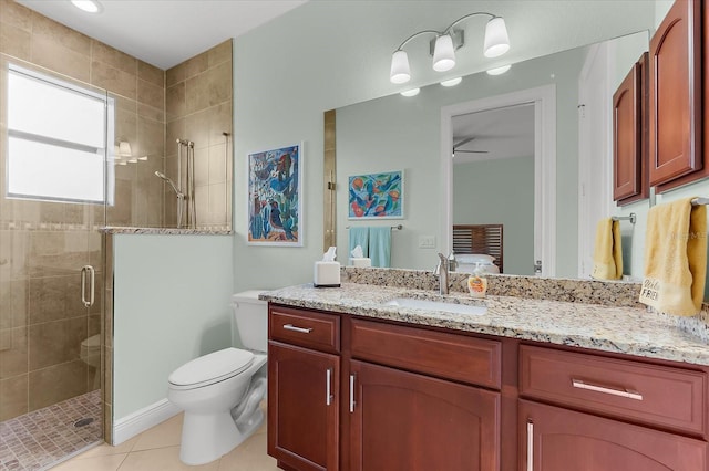 10029 Boylston St, Port Charlotte, FL 33981 - bathroom with a shower stall, vanity, tile patterned floors, and ceiling fan