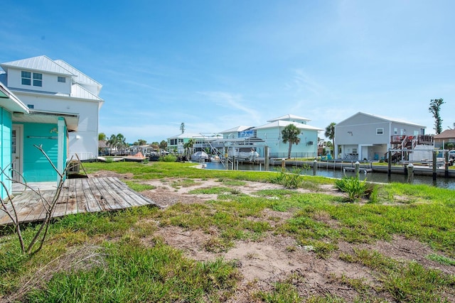 10452 Raymond St, Englewood, FL 34224 - view of yard featuring a water view and a residential view