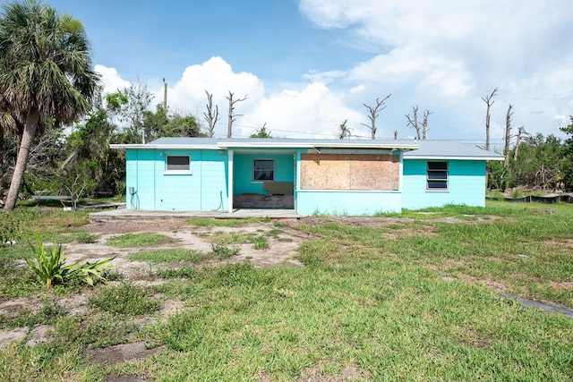 10452 Raymond St, Englewood, FL 34224 - view of front of house with a front yard