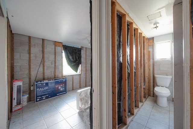 10452 Raymond St, Englewood, FL 34224 - bathroom featuring toilet and tile patterned flooring