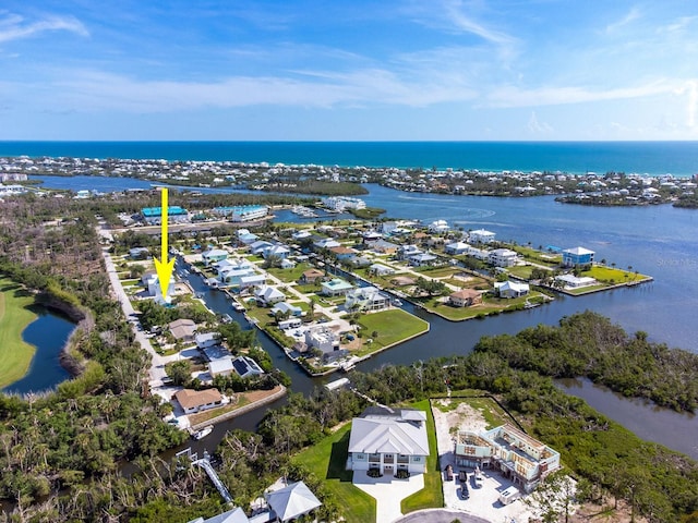10452 Raymond St, Englewood, FL 34224 - aerial perspective of suburban area featuring a large body of water
