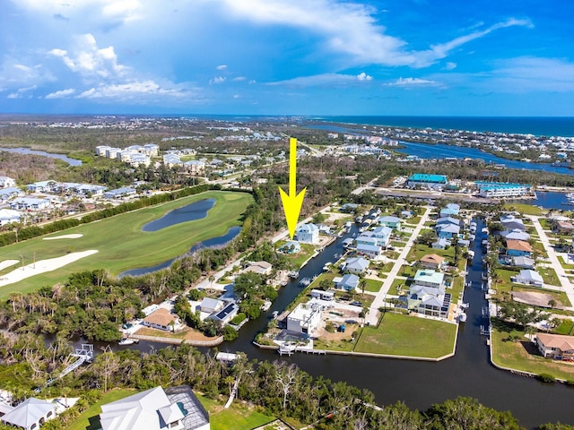 10452 Raymond St, Englewood, FL 34224 - aerial view of residential area with a nearby body of water and a golf course