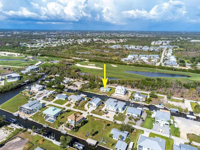 10452 Raymond St, Englewood, FL 34224 - aerial overview of property's location featuring a large body of water and nearby suburban area