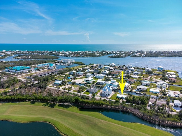10452 Raymond St, Englewood, FL 34224 - aerial perspective of suburban area featuring a golf club and a nearby body of water