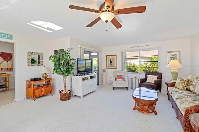 609 Deerwood Ave, Englewood, FL 34223 - carpeted living room with a ceiling fan