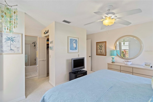 609 Deerwood Ave, Englewood, FL 34223 - bedroom with light carpet and a ceiling fan