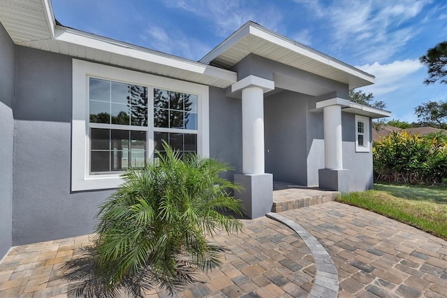5781 Elton Rd, Venice, FL 34293 - view of exterior entry featuring stucco siding