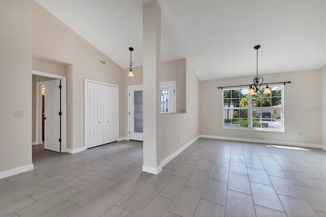 5781 Elton Rd, Venice, FL 34293 - unfurnished room featuring a chandelier, high vaulted ceiling, and wood finished floors
