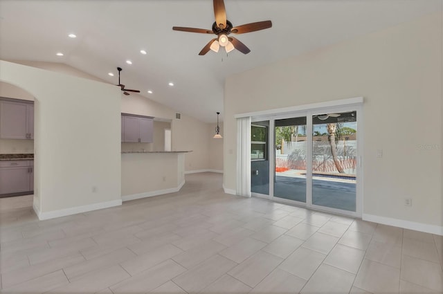 5781 Elton Rd, Venice, FL 34293 - unfurnished living room featuring ceiling fan, lofted ceiling, recessed lighting, and arched walkways