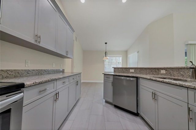 5781 Elton Rd, Venice, FL 34293 - kitchen featuring appliances with stainless steel finishes, hanging light fixtures, light stone countertops, and gray cabinets