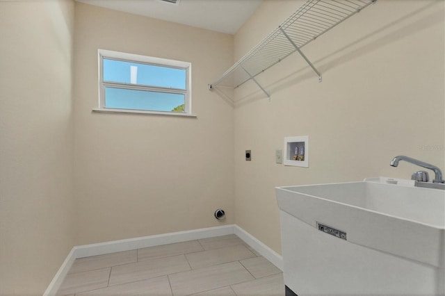 5781 Elton Rd, Venice, FL 34293 - laundry room featuring washer hookup, electric dryer hookup, and light tile patterned floors
