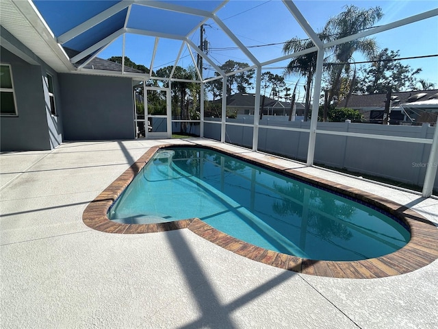 5781 Elton Rd, Venice, FL 34293 - view of swimming pool featuring a patio and a lanai