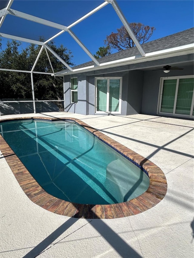 5781 Elton Rd, Venice, FL 34293 - outdoor pool with a patio, glass enclosure, and ceiling fan