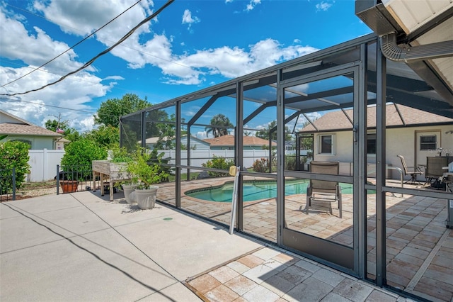 7218 Darlington St, Englewood, FL 34224 - fenced backyard with a patio and glass enclosure
