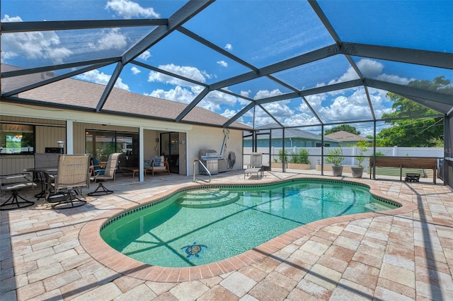 7218 Darlington St, Englewood, FL 34224 - view of swimming pool featuring a patio, grilling area, and glass enclosure