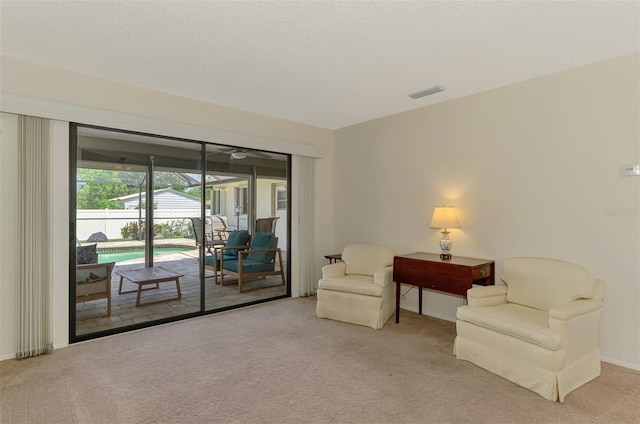 7218 Darlington St, Englewood, FL 34224 - living area featuring carpet and baseboards