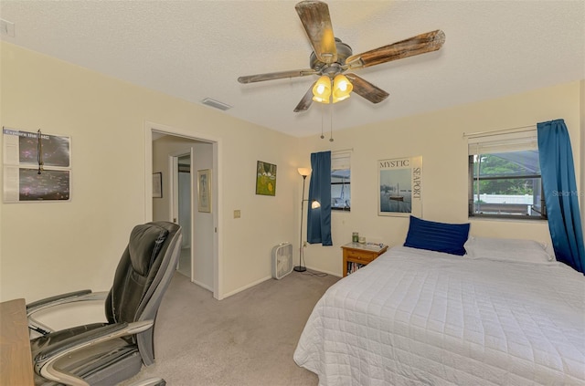 7218 Darlington St, Englewood, FL 34224 - bedroom with carpet flooring, a desk, ceiling fan, and a textured ceiling