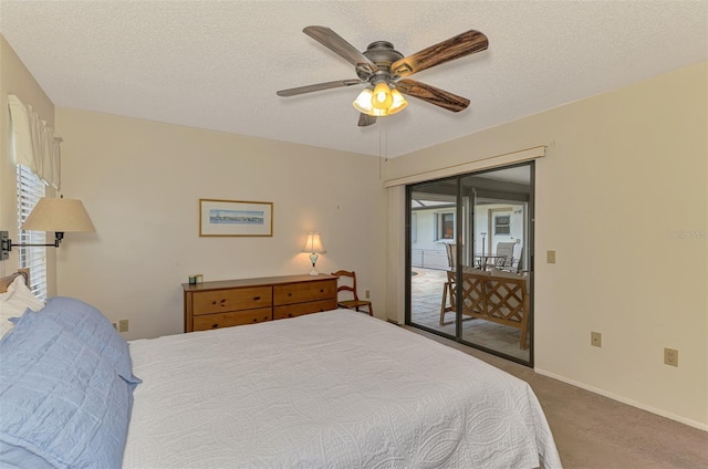 7218 Darlington St, Englewood, FL 34224 - carpeted bedroom featuring ceiling fan, a textured ceiling, and access to outside