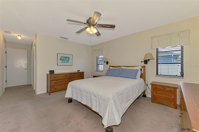 7218 Darlington St, Englewood, FL 34224 - bedroom with light colored carpet and a ceiling fan