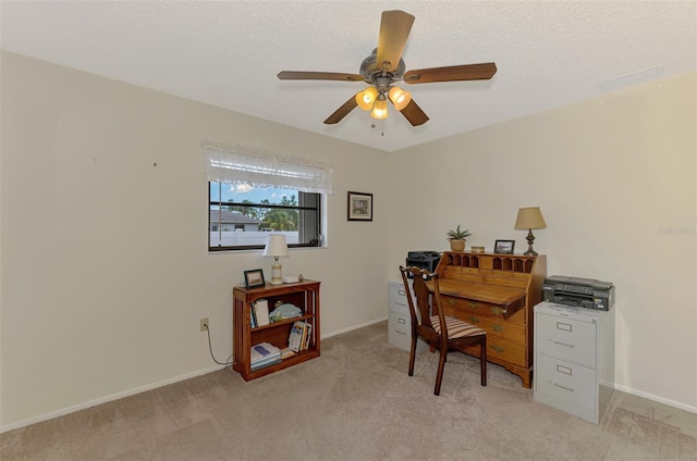 7218 Darlington St, Englewood, FL 34224 - office space with light colored carpet, ceiling fan, and a textured ceiling