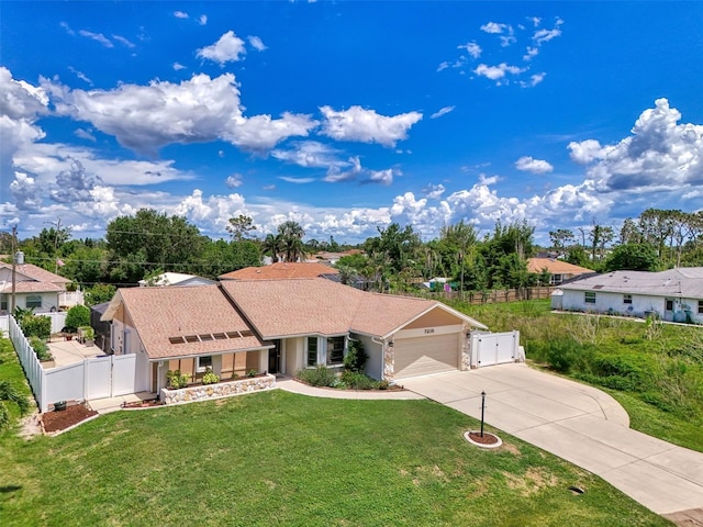 7218 Darlington St, Englewood, FL 34224 - view of front of home featuring an attached garage and driveway
