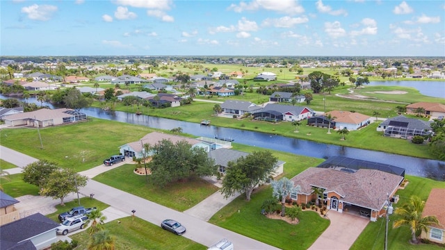 104 Mark Twain Ln, Rotonda West, FL 33947 - aerial view of residential area featuring a nearby body of water