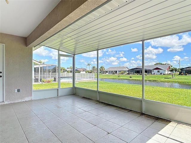 104 Mark Twain Ln, Rotonda West, FL 33947 - unfurnished sunroom with a water view and a residential view