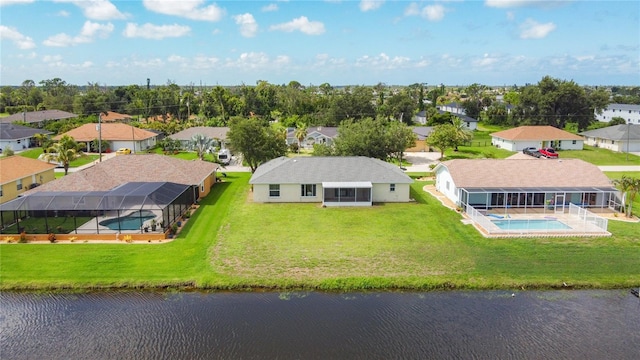 104 Mark Twain Ln, Rotonda West, FL 33947 - aerial view of residential area featuring a pool area and a large body of water