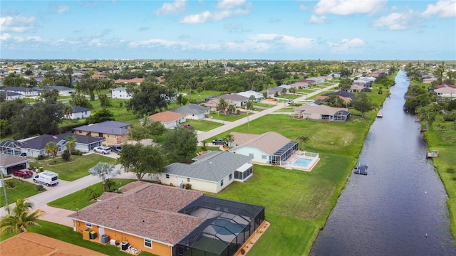 104 Mark Twain Ln, Rotonda West, FL 33947 - aerial view of residential area with a large body of water