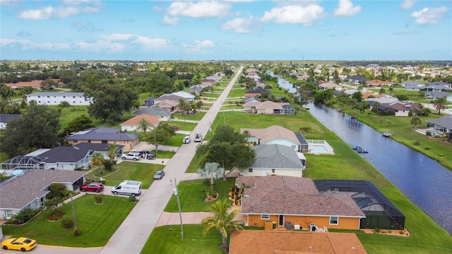 104 Mark Twain Ln, Rotonda West, FL 33947 - aerial perspective of suburban area featuring a large body of water