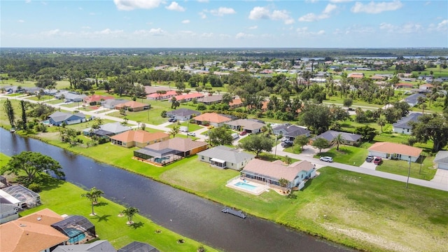 104 Mark Twain Ln, Rotonda West, FL 33947 - aerial view of residential area with a large body of water