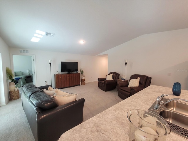 7168 Rison St, Port Charlotte, FL 33981 - living room with light colored carpet and vaulted ceiling