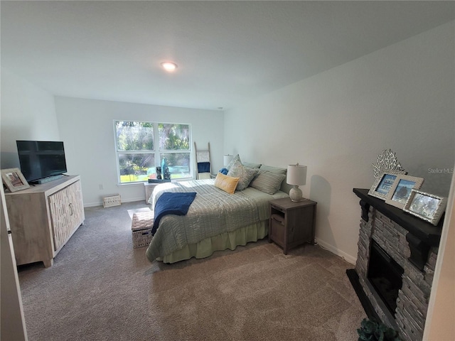 7168 Rison St, Port Charlotte, FL 33981 - bedroom featuring carpet and a stone fireplace