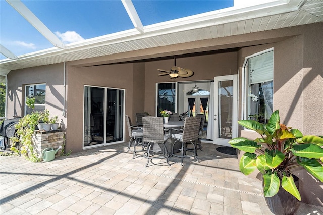7376 Stetson Ln, Port Charlotte, FL 33981 - view of patio / terrace featuring ceiling fan, glass enclosure, and outdoor dining area