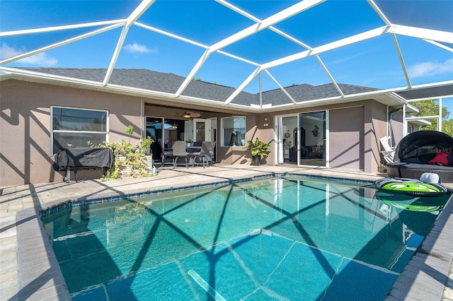 7376 Stetson Ln, Port Charlotte, FL 33981 - swimming pool featuring a patio area, glass enclosure, and a ceiling fan