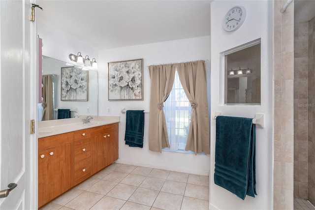 7376 Stetson Ln, Port Charlotte, FL 33981 - full bath with double vanity, tile patterned floors, and a tile shower