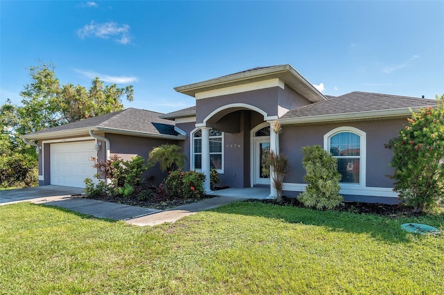 7376 Stetson Ln, Port Charlotte, FL 33981 - view of front facade with stucco siding, a garage, a front lawn, driveway, and roof with shingles