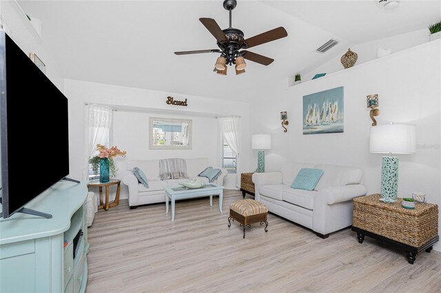 926 Boundary Blvd, Rotonda West, FL 33947 - living room with a ceiling fan, light wood-style floors, and lofted ceiling