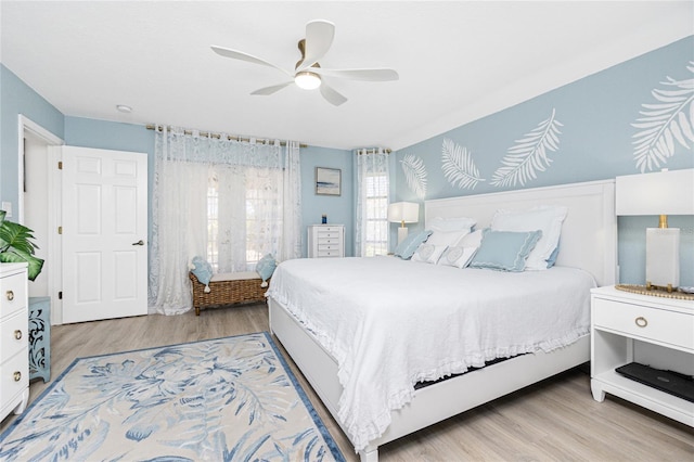 926 Boundary Blvd, Rotonda West, FL 33947 - bedroom featuring wood finished floors and a ceiling fan