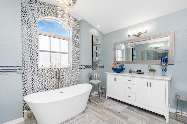 926 Boundary Blvd, Rotonda West, FL 33947 - full bath with a soaking tub and vanity