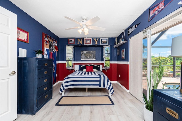 926 Boundary Blvd, Rotonda West, FL 33947 - bedroom featuring wood finished floors and baseboards