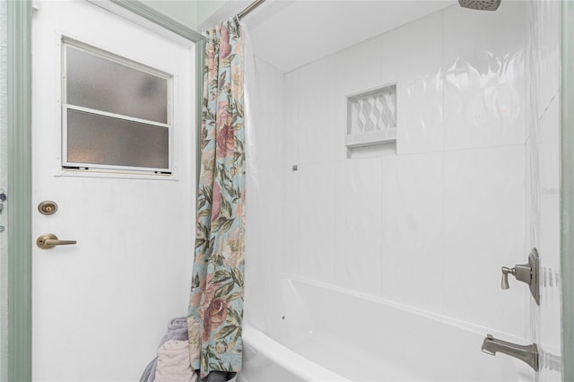 926 Boundary Blvd, Rotonda West, FL 33947 - bathroom with shower / tub combo with curtain