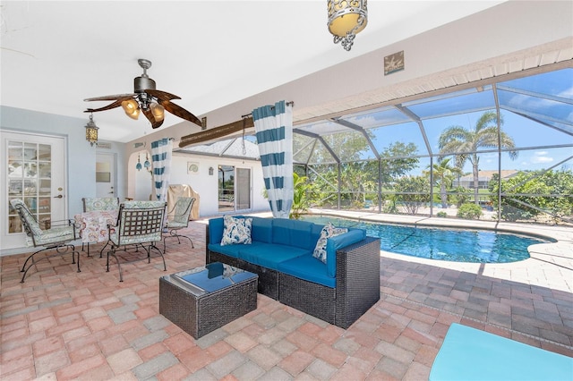 926 Boundary Blvd, Rotonda West, FL 33947 - view of patio / terrace featuring a ceiling fan, an outdoor pool, a lanai, outdoor lounge area, and outdoor dining space