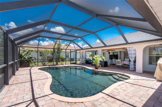 926 Boundary Blvd, Rotonda West, FL 33947 - swimming pool with a patio area, a ceiling fan, and an outdoor living space
