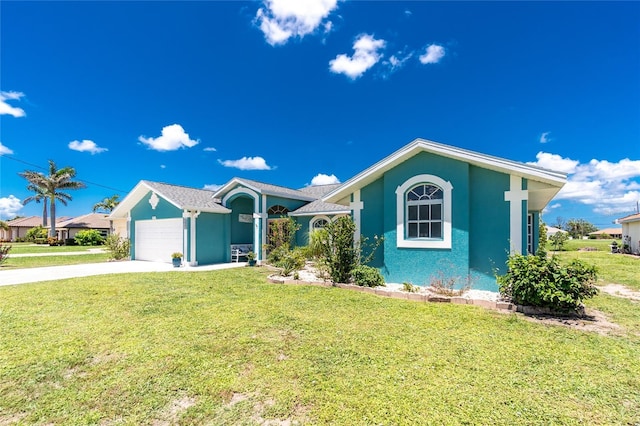 926 Boundary Blvd, Rotonda West, FL 33947 - ranch-style home with stucco siding, driveway, an attached garage, and a front lawn